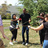 students working on a challenge course