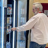 A man using a vending machine 
